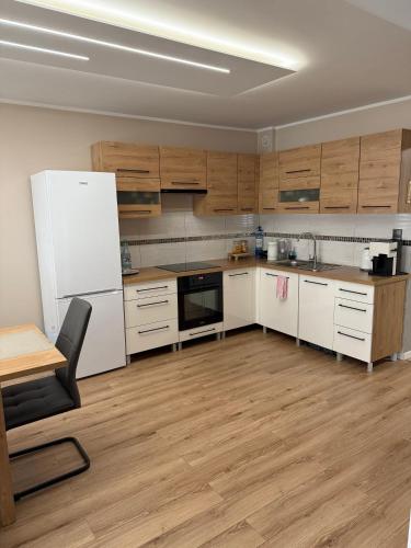 Η κουζίνα ή μικρή κουζίνα στο Apartament 11 na 10