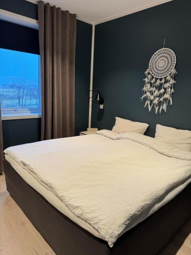 Katil atau katil-katil dalam bilik di Modern and cozy home in Andenes