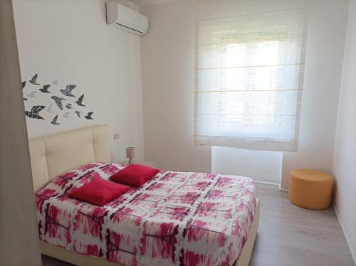 A bed or beds in a room at Affittacamere Piagge