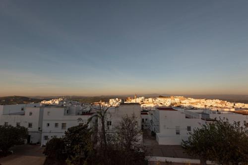 a view of a city with white buildings at Casa Susan, Penthouse apartment, view over Old Town & the Sea in Vejer de la Frontera