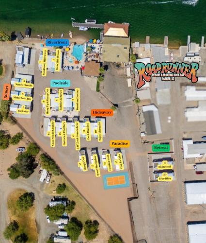 an overhead view of a parking lot with yellow signs at Viva La Vida! Roadrunner Resort in Parker