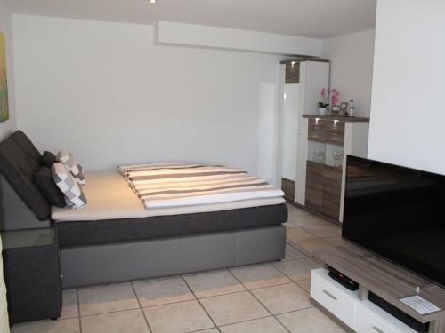Postel nebo postele na pokoji v ubytování Ferienwohnung Am Fischteich