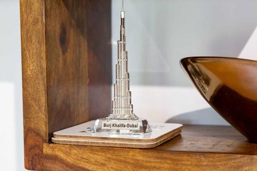 a model of the burj khalifa on a table at Modern and Spacious 3 Bedroom Home in Peterborough in Peterborough