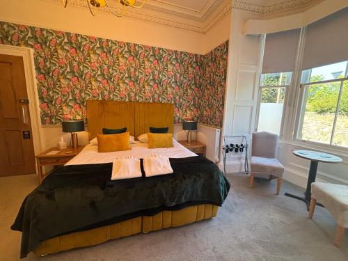 Un ou plusieurs lits dans un hébergement de l'établissement Grangeview Guest House