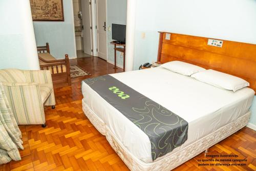 Postel nebo postele na pokoji v ubytování VOA Hotel Caxambu
