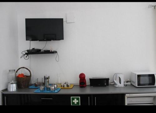 Dapur atau dapur kecil di Mont' Sobro Hostel