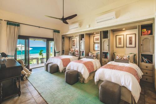 Katil atau katil-katil dalam bilik di Casa Bellamar by Cabo Villas