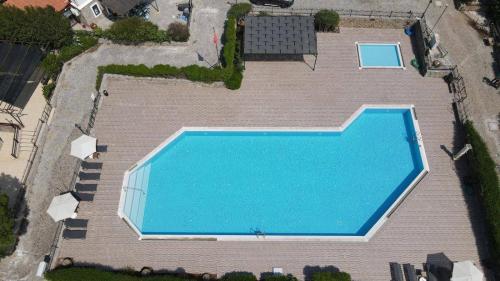 Der Swimmingpool an oder in der Nähe von Oludeniz Luxury Villa with Jacuzzi, Common Pool