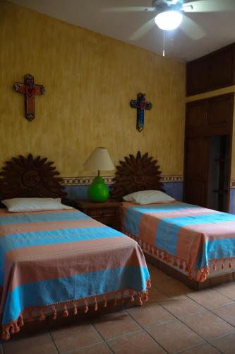 Ein Bett oder Betten in einem Zimmer der Unterkunft Villas Don Zeferino
