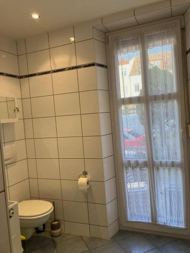 Ένα μπάνιο στο Lebendige Wohnung mit Wohlfühlcharakter