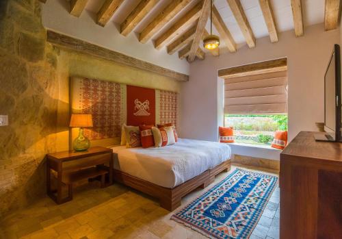 Ένα ή περισσότερα κρεβάτια σε δωμάτιο στο Villa Piedra Blanca by Cabo Villas