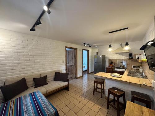 Kuchyň nebo kuchyňský kout v ubytování Apartamentos Otorongo Cuenca Ecuador