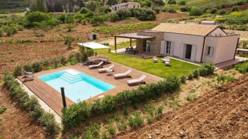 an aerial view of a house with a swimming pool at Villa Manù country house in Castellammare del Golfo