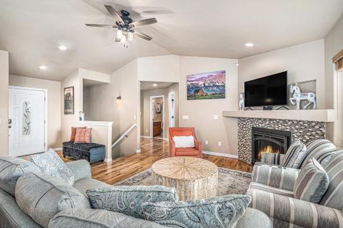a living room with two couches and a fireplace at Ranch Retreat W Hot Tub & Patio in Cheyenne