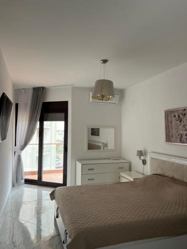 Ένα ή περισσότερα κρεβάτια σε δωμάτιο στο Beautiful comfort apartment