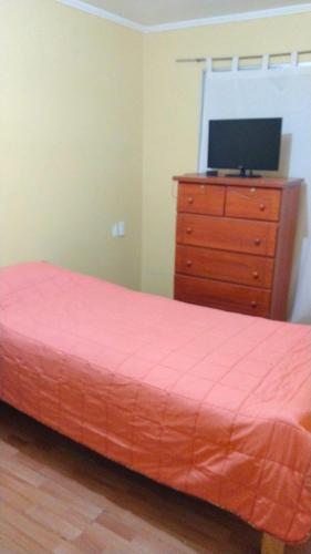 Postel nebo postele na pokoji v ubytování Hostal Nancy