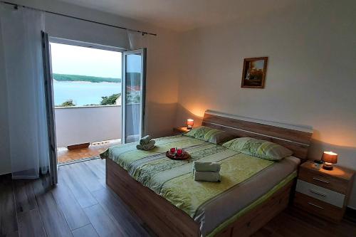 Apartments by the sea Supetarska Draga - Gonar, Rab - 24383