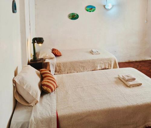 Postel nebo postele na pokoji v ubytování Hostel Che Camba