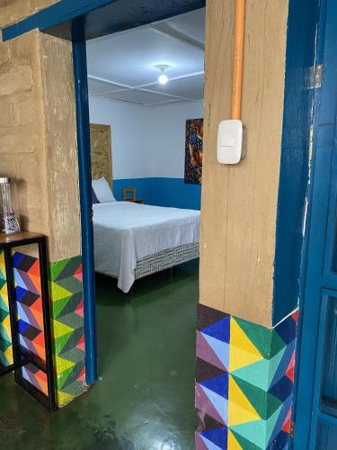 Ein Bett oder Betten in einem Zimmer der Unterkunft El Chirris Las Artes