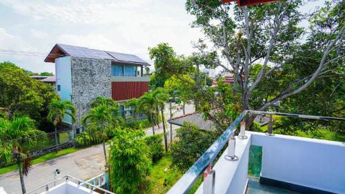 a view of a building from the balcony of a house at Serene Villa Airport Transit in Katunayake
