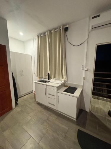 Cuina o zona de cuina de Colony Stay