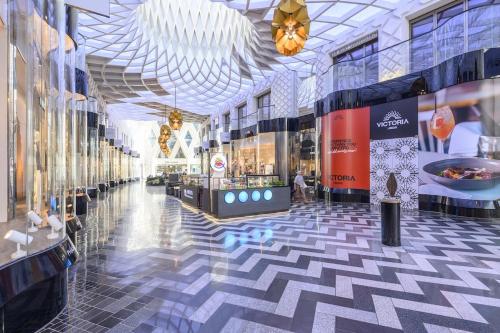 a rendering of the lobby of a shopping mall at Paradise Boutique Deluxe - Leeds City Center - Steps to Ivy Asia in Leeds