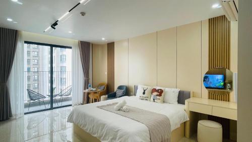 Ένα ή περισσότερα κρεβάτια σε δωμάτιο στο Vinhomes D'Capitale - studio Apt