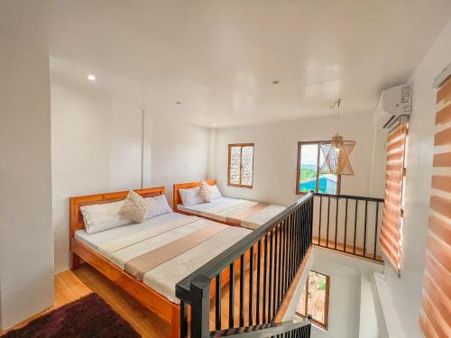Postel nebo postele na pokoji v ubytování Casita Lodge