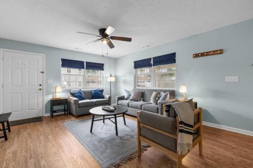 a living room with a couch and a ceiling fan at *COMFY N. MYRTLE HOUSE*3 NEW Queens*Steps to the Beach*V384 in Myrtle Beach