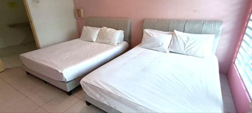 Katil atau katil-katil dalam bilik di Ipoh Meru Animation Homestay by Grab A Stay