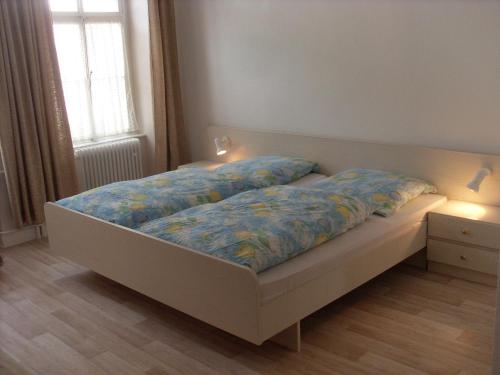 Gästehaus Viktoria tesisinde bir odada yatak veya yataklar