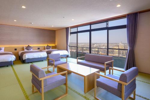 Una cama o camas en una habitación de Ooedo Onsen Monogatari Premium Yamashitaya