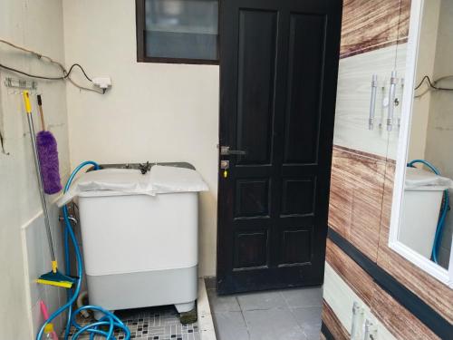 Koupelna v ubytování Homestay Jogja 999