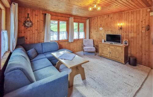 Televízia a/alebo spoločenská miestnosť v ubytovaní Authentisches Ferienhaus