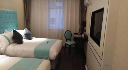 Katil atau katil-katil dalam bilik di Xana Lite Shenyang Beiling Park Liaoning Building Branch