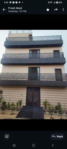 a picture of a building with a balcony at Khas Mahal Homestay in Agra