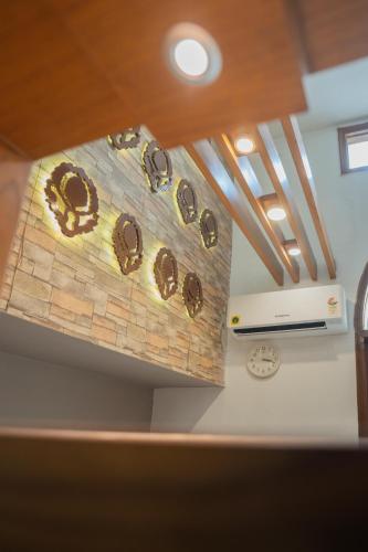 a bunch of donuts on a wall in a room at Ahuja Residency DLF Phase 2 in Gurgaon