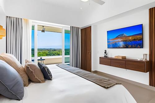 Postel nebo postele na pokoji v ubytování Refugio de ensueño con acceso a la playa