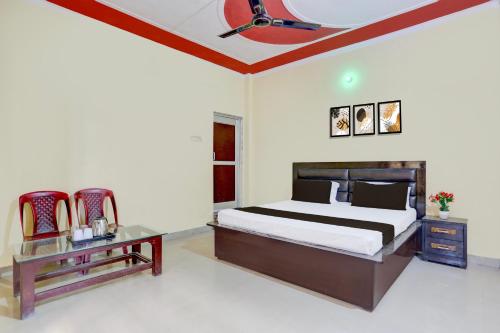 Postel nebo postele na pokoji v ubytování Hotel O NKA