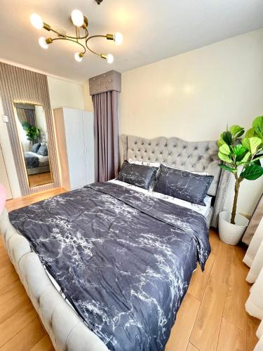 Ένα ή περισσότερα κρεβάτια σε δωμάτιο στο Seawind Condominum Unit 4M