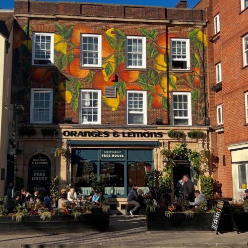 a building with a mural on the side of it at The Oxford Veranda in Oxford