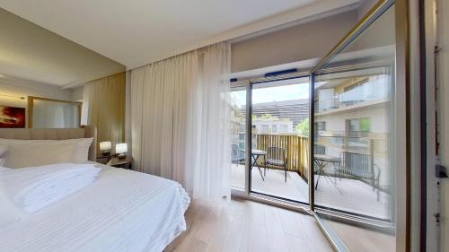 Ένα ή περισσότερα κρεβάτια σε δωμάτιο στο RCS Apartment Czysta 123