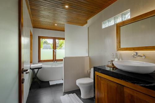 Ένα μπάνιο στο Green Weca Ubud Villa