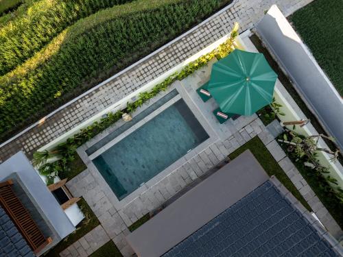 Πισίνα στο ή κοντά στο Green Weca Ubud Villa