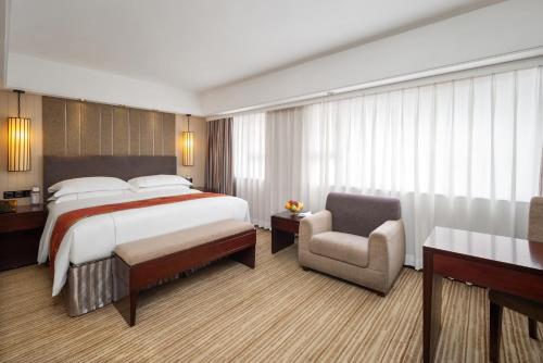 Katil atau katil-katil dalam bilik di Hotel Beverly Plaza