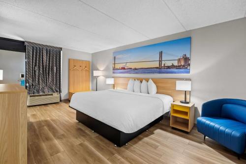Ένα ή περισσότερα κρεβάτια σε δωμάτιο στο Days Inn by Wyndham Statesboro