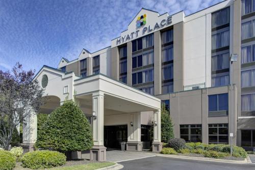 a rendering of the front of the hotel palace at Hyatt Place Charlotte Airport Billy Graham Parkway in Charlotte