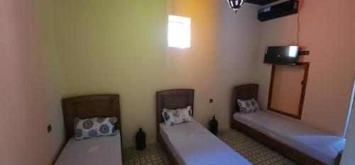 Un ou plusieurs lits dans un hébergement de l'établissement Medina 2