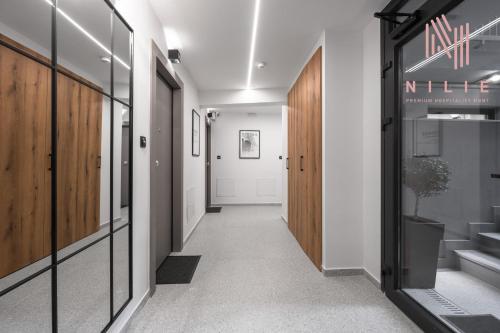 a corridor in a hospital hallway with a hallway at Room8, Nilie Hospitality MGMT in Thessaloniki