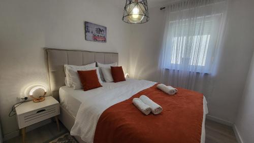 Postel nebo postele na pokoji v ubytování Apartments Teodo